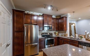 Granite countertops and stainless steel appliances